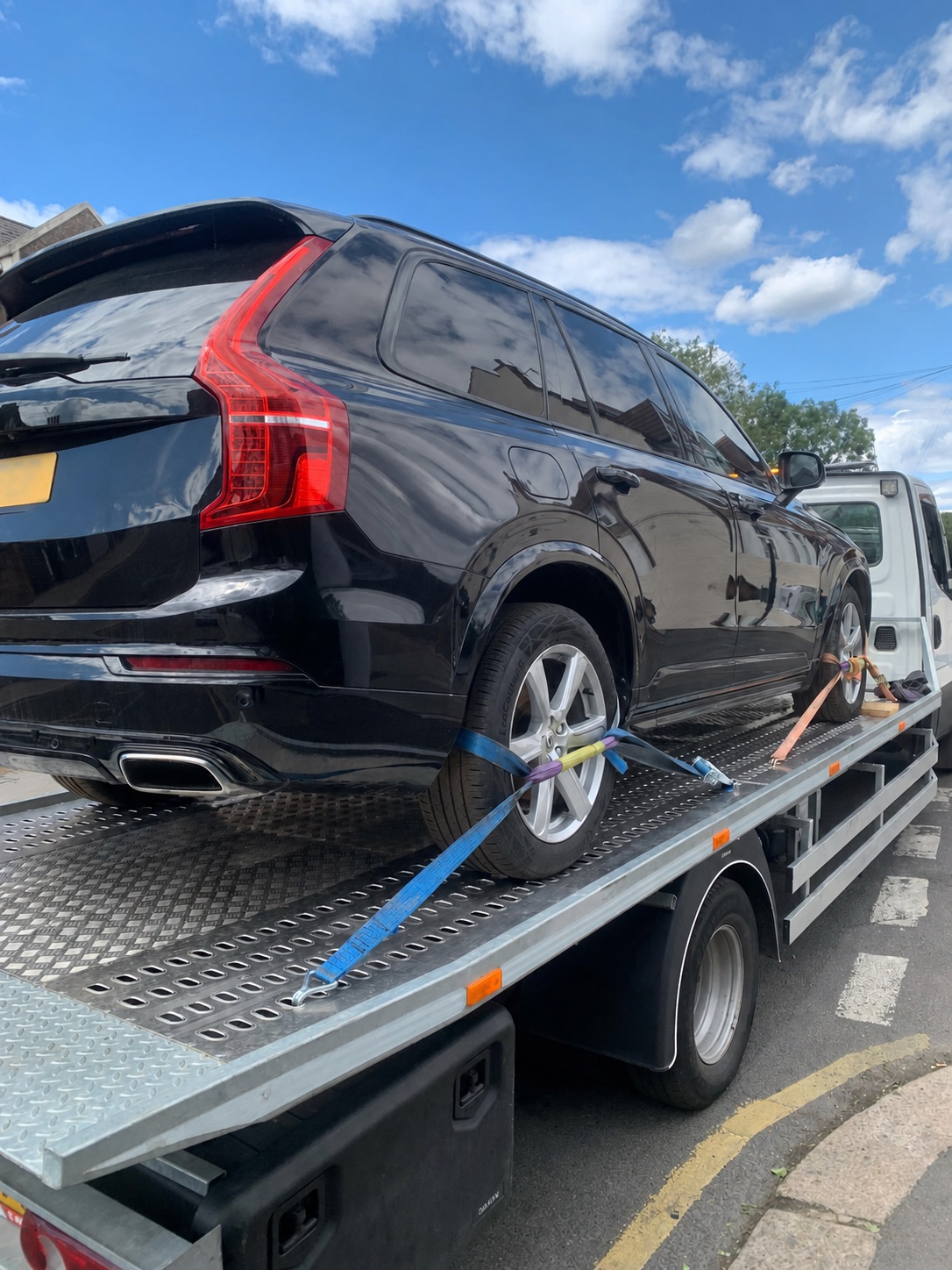 Black SUV secured for accident recovery in North East London